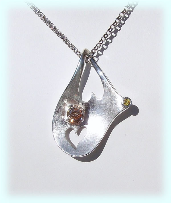click to go to pendants and necklaces