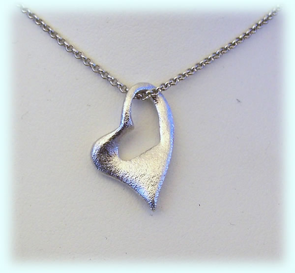 click to go to pendants and necklaces