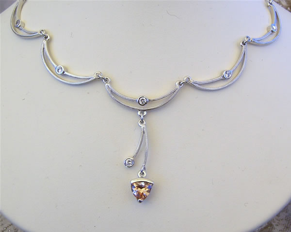 click to go to pendants and necklaces